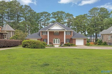 Experience exceptional waterfront living in this full brick - photo 6