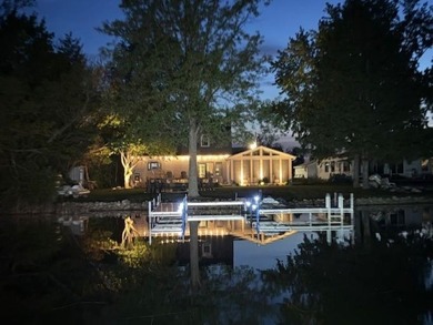 This beautifully updated 4-bedroom, 2-bath home on Barton Lake - photo 1