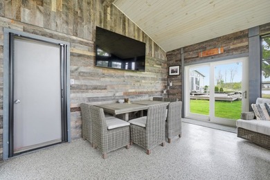 This beautifully updated 4-bedroom, 2-bath home on Barton Lake - photo 7