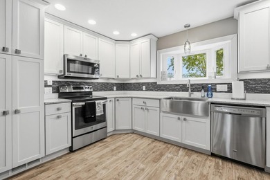 This beautifully updated 4-bedroom, 2-bath home on Barton Lake - photo 10