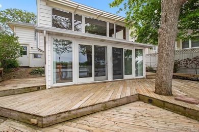 Lake season is finally here. Built in 1921, this cottage is full - photo 2