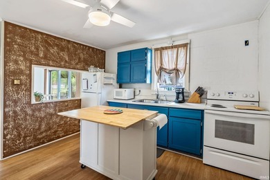 Enjoy waterfront living with this adorable 2-bedroom, 1-bath - photo 3
