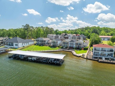 Welcome to lake living at its finest in the gated waterfront - photo 2