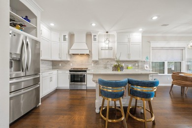 Welcome to lake living at its finest in the gated waterfront - photo 9