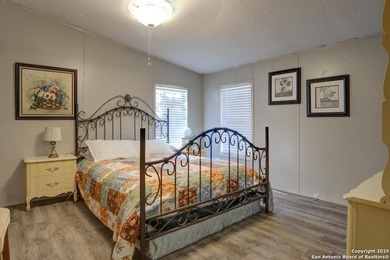 Welcome to 1400 Elmhurst Dr, Lakehills, TX! This charming - photo 3
