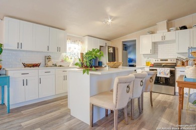 Welcome to 1400 Elmhurst Dr, Lakehills, TX! This charming - photo 4