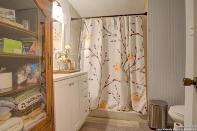 Welcome to 1400 Elmhurst Dr, Lakehills, TX! This charming - photo 7