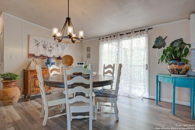 Welcome to 1400 Elmhurst Dr, Lakehills, TX! This charming - photo 8
