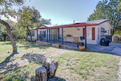 Welcome to 1400 Elmhurst Dr, Lakehills, TX! This charming - photo 9