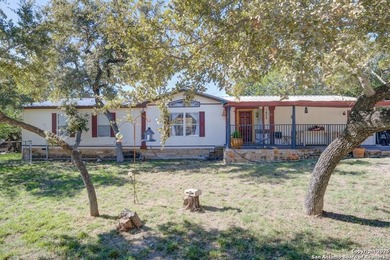 Welcome to 1400 Elmhurst Dr, Lakehills, TX! This charming - photo 10