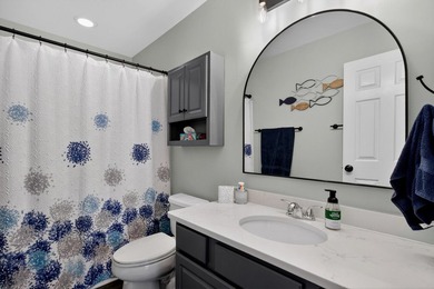 This recently renovated townhome, with updates that actually - photo 14