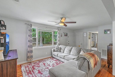 Tucked beneath mature trees in the heart of West Ashley, this - photo 9