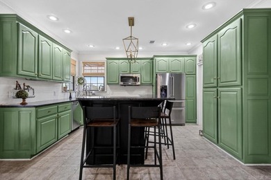 Welcome home to this beautifully designed 4-bedroom, 2.5-bath - photo 9