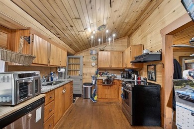 Nestled on nearly an acre, this charming three-bedroom - photo 13