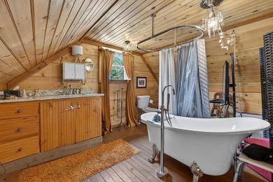 Nestled on nearly an acre, this charming three-bedroom - photo 23