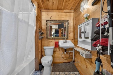 Nestled on nearly an acre, this charming three-bedroom - photo 27
