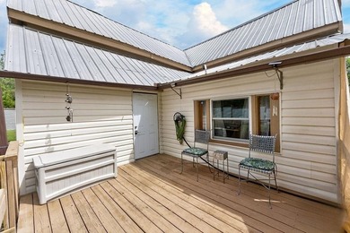 Nestled on nearly an acre, this charming three-bedroom - photo 29