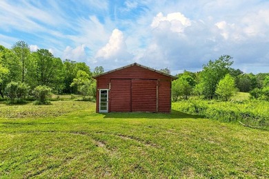 Nestled on nearly an acre, this charming three-bedroom - photo 33