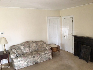 This family-owned two-family home has never been rented. First - photo 5