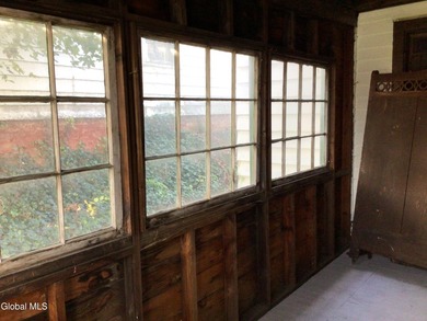 This family-owned two-family home has never been rented. First - photo 8