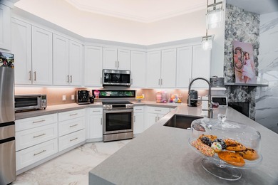 Welcome to this fully renovated lakefront home tucked away on a - photo 16