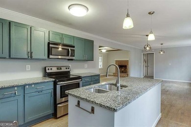 Welcome to Rowland Hills and this 4-bedroom, 3-bathroom Stone