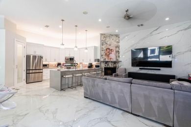 Welcome to this fully renovated lakefront home tucked away on a - photo 21
