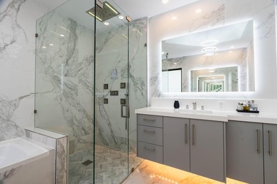 Welcome to this fully renovated lakefront home tucked away on a - photo 34