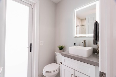 Welcome to this fully renovated lakefront home tucked away on a - photo 38
