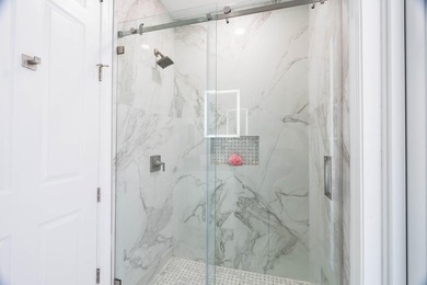 Welcome to this fully renovated lakefront home tucked away on a - photo 39
