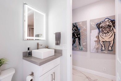 Welcome to this fully renovated lakefront home tucked away on a - photo 50