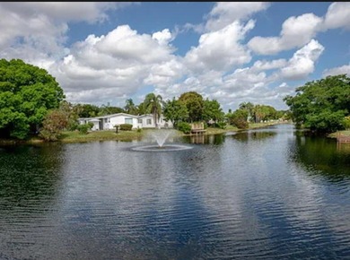 THIS IS A BEAUTIFUL SINGLE SIZE 2/2 MOBILE HOMES LOCATED IN A - photo 22