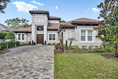 One-of-a-kind custom Gold Coast home, tucked within the private - photo 1