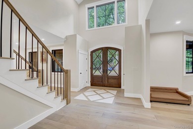 Welcome to 301 Old Mill Road, a masterfully crafted custom-built - photo 4
