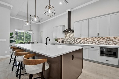 One-of-a-kind custom Gold Coast home, tucked within the private - photo 5
