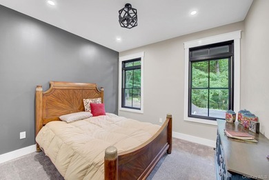 Welcome to 301 Old Mill Road, a masterfully crafted custom-built - photo 10