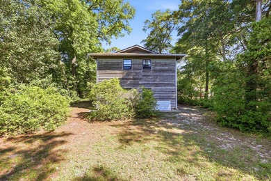 Tucked beneath a canopy of mature trees just minutes from the - photo 44