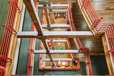 Impressively renovated in 2018, this penthouse-level unit