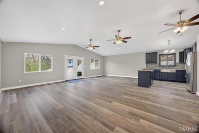 Vaulted ceilings, natural light, and quick lake access. This is - photo 9