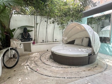 This beautiful garden level condo for sale on Calle 38 in Playa