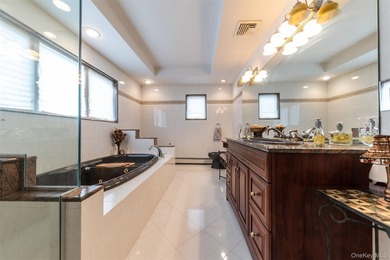Custom-built Oceanside Colonial with 4 bedrooms, 2.5 baths and - photo 14