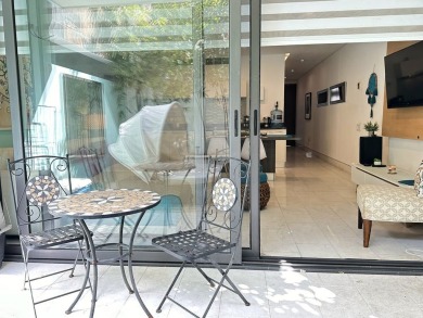 This beautiful garden level condo for sale on Calle 38 in Playa