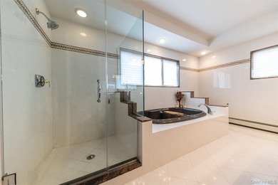 Custom-built Oceanside Colonial with 4 bedrooms, 2.5 baths and - photo 15