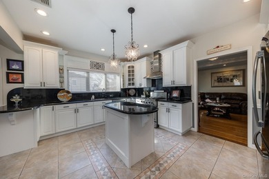 Custom-built Oceanside Colonial with 4 bedrooms, 2.5 baths and - photo 19