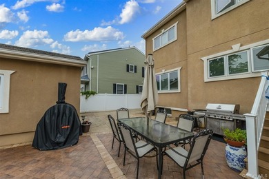 Custom-built Oceanside Colonial with 4 bedrooms, 2.5 baths and - photo 24