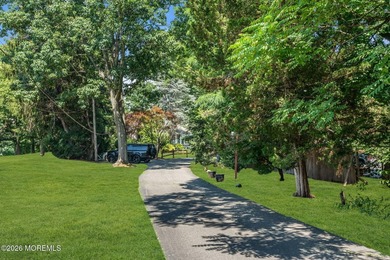 Travel down the long winding driveway to live your best life on - photo 5