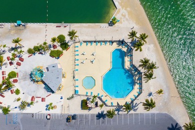 Spectacular peekaboo open water views abound with this updated 2 - photo 3