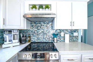 Spectacular peekaboo open water views abound with this updated 2 - photo 4