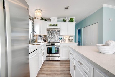 Spectacular peekaboo open water views abound with this updated 2 - photo 7