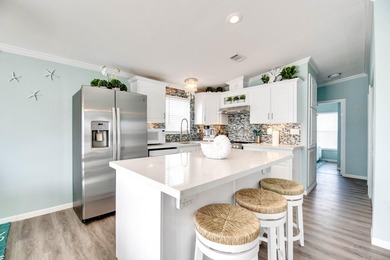 Spectacular peekaboo open water views abound with this updated 2 - photo 8